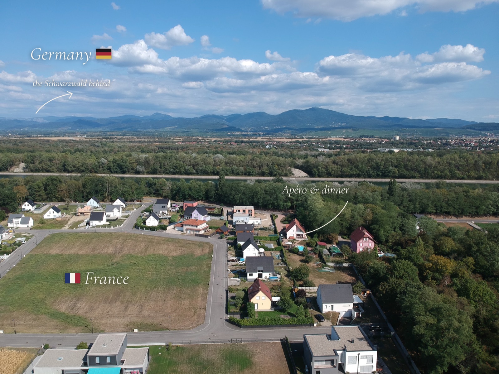 Aerial view marking the apéro & dinner venue in Chalampé, with France, Germany and the Schwarzwald behind